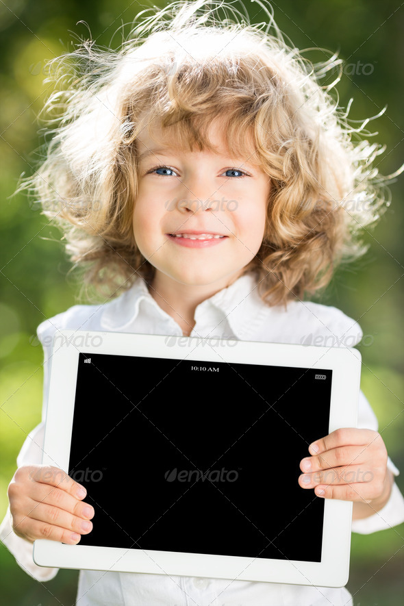 Child holding tablet PC