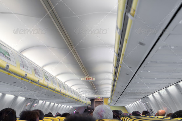 interior of an airplane cabin with row of seats