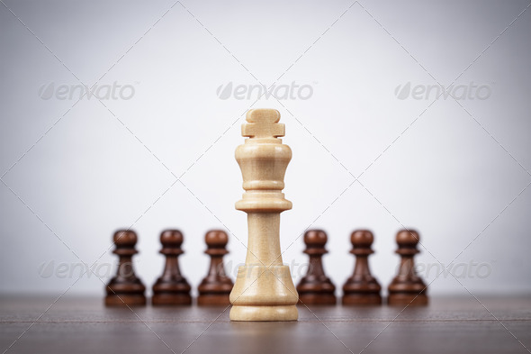 Chess Leadership Concept Over Grey Background