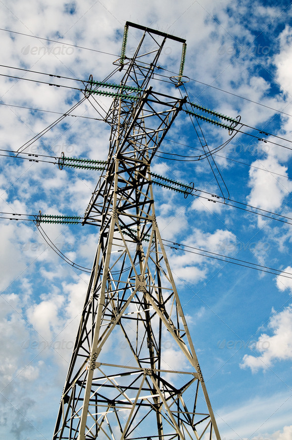 Electrical pylon on a background of the blue sky.
