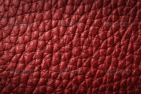 Genuine red leather background, pattern. High resolution photograph.