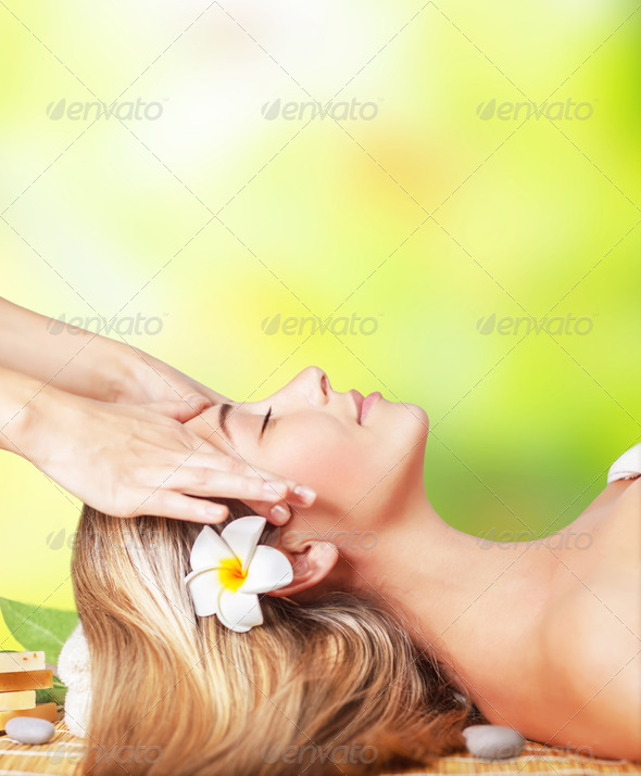 Relaxing day at spa, calm beautiful woman lying down on massage table, facial medical therapy, skin care, female beauty and vacation concept