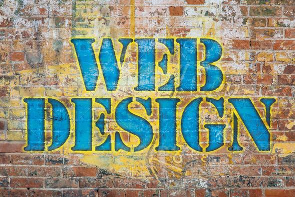 web design, colorful graffiti text on a grunge brick wall, graphics created by the photographer