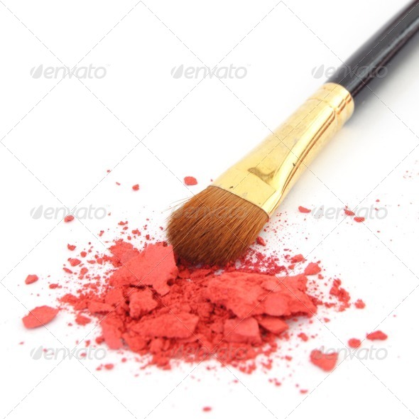 makeup brush and cosmetic powder