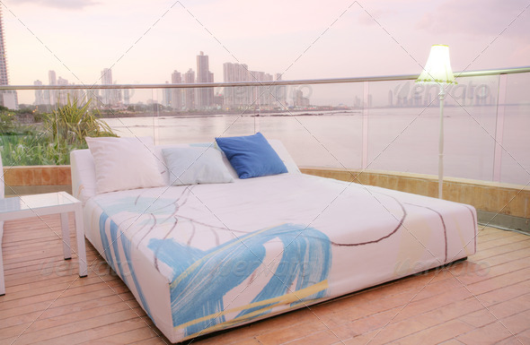 Cozy outdoor bedroom in the sunset