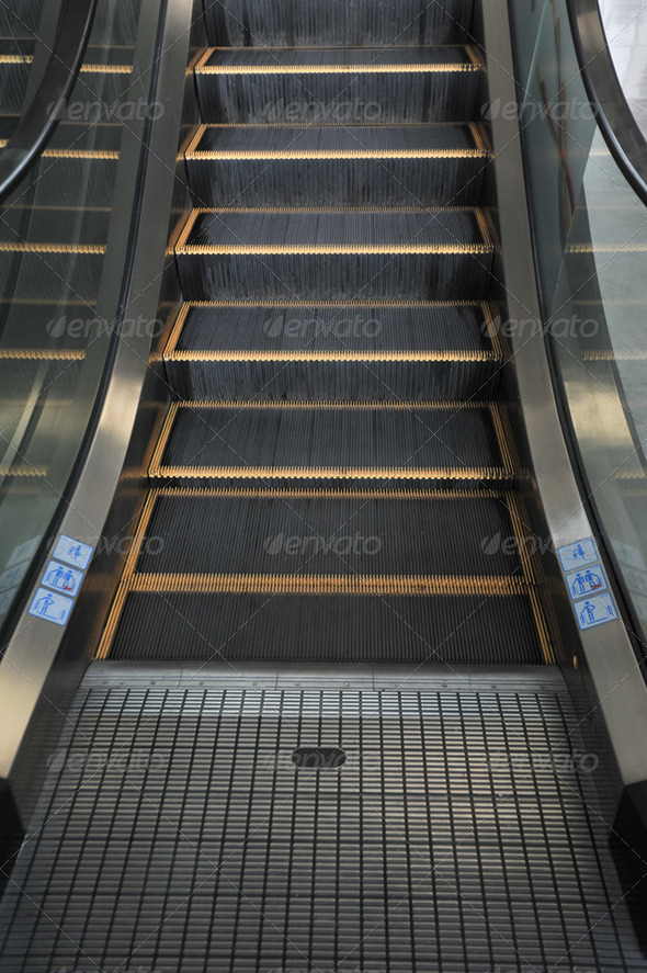 Empty escalator stairs logo warning